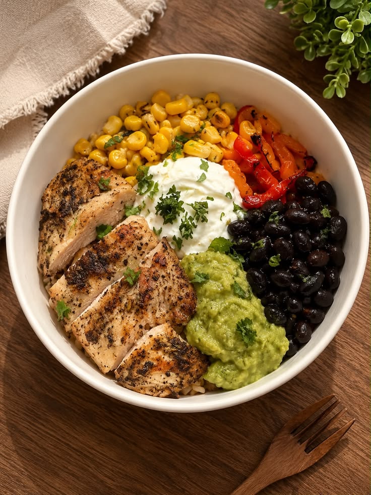 Healthy colorful meal bowl with vegetables and grilled chicken